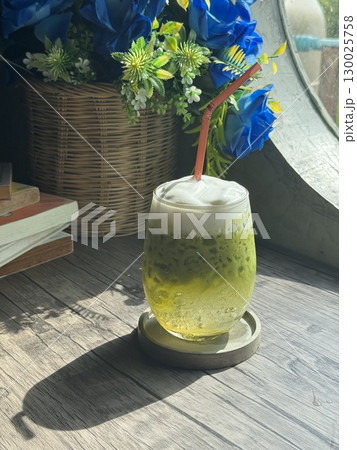 Refreshing Green Iced Tea with Coconut Water Healthy and Delicious Summer Beverage Refreshing Green Iced Tea with Coconut Water Healthy and Delicious Summer Beverage 130025758