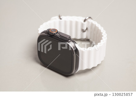 Modern Wireless Smart watch on gray background 130025857