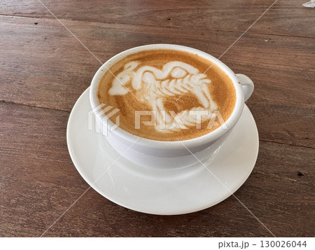 Delicious Cappuccino with Perfect Foam and Cocoa Dusting in a Minimalist White Cup 130026044