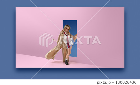 Creative collage of stylish woman in coat and tie stepping through surreal doorway in pastel pink wall. 130026430