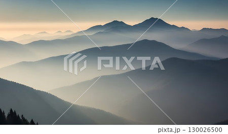 Misty mountain peaks fading into the horizon. 130026500