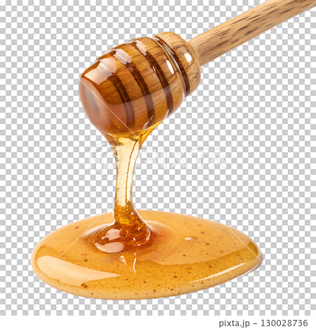 Golden honey pouring smoothly from a wooden dipper isolated on transparent background 130028736