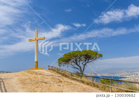 La Cruz de Benidorm La Creu giant cross on mountain hill Serra Gelada natural park, aerial view of Mediterranean Sea water with Costa Blanca coast and Benidorm city coastline in summer day, Spain La Cruz de Benidorm La Creu giant cross on mountain hill Serra Gelada natural park, aerial view of Mediterranean Sea water with Costa Blanca coast and Benidorm city coastline in summer day, Spain 130030682
