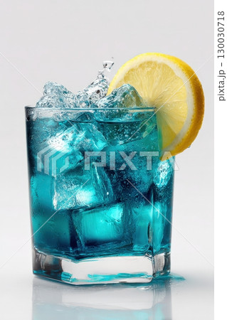 Refreshing Blue Cocktail with Ice and Lemon on White Background 130030718