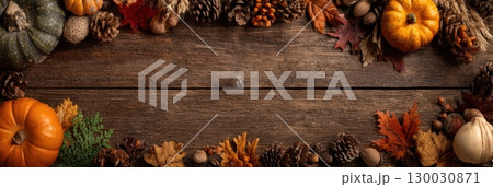 Creative autumn rustic composition. Different pumpkins, colorful leaves on a rustic old wooden background. Template fall harvest thanksgiving, anniversary invitation card. Halloween Long Wide Banner Creative autumn rustic composition. Different pumpkins, colorful leaves on a rustic old wooden background. Template fall harvest thanksgiving, anniversary invitation card. Halloween Long Wide Banner 130030871
