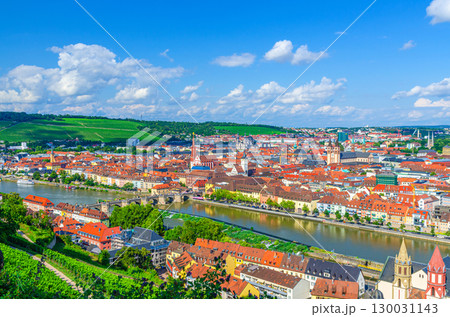 Aerial panoramic view of Wurzburg old town altstadt with Main river, green hills with vineyard, skyline horizon panorama of Wurzburg city historical center, Lower Franconia region, Germany 130031143