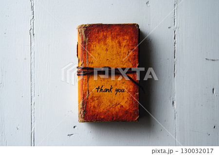 Vintage thank you notebook with a rustic design, leather cover, and warm colors 130032017