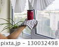 Woman holds on the towel home made jam 130032498