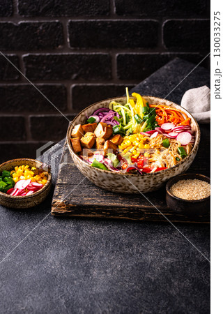 Vegan healthy poke bowl with tofu 130033275