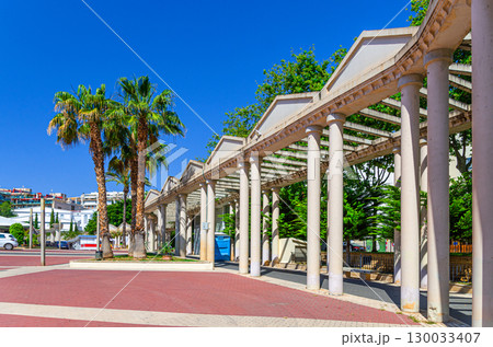 Placa Major Plaza Mayor Main square with colonnade columns and palm trees in old town Calpe city historic centre in summer day, Calp Casco Antiguo, province of Alicante, Valencian Community, Spain Placa Major Plaza Mayor Main square with colonnade columns and palm trees in old town Calpe city historic centre in summer day, Calp Casco Antiguo, province of Alicante, Valencian Community, Spain 130033407