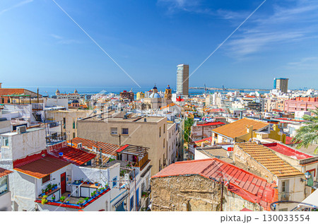 Aerial panoramic view of old town Alicante, panorama of Alicante city historical centre, Barrio de Santa Cruz quarter, Alicante bay of Mediterranean Sea skyline horizon, Valencian Community, Spain Aerial panoramic view of old town Alicante, panorama of Alicante city historical centre, Barrio de Santa Cruz quarter, Alicante bay of Mediterranean Sea skyline horizon, Valencian Community, Spain 130033554