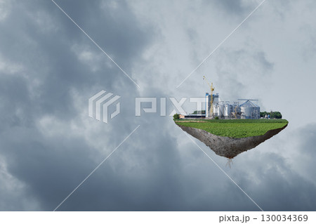 Floating agricultural factory amidst cloudy skies. 130034369