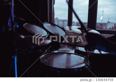 Drum kit close-up. Drum stands in close-up. Drummer's place. Rehearsal before the concert 130034759