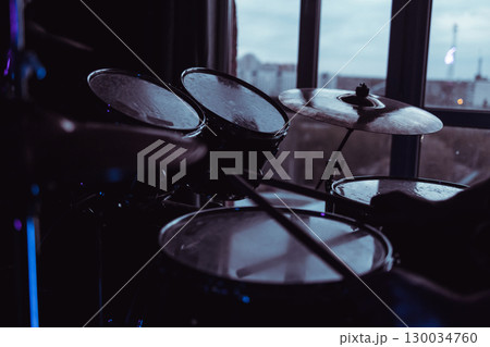 Drum kit close-up. Drum stands in close-up. Drummer's place. Rehearsal before the concert 130034760