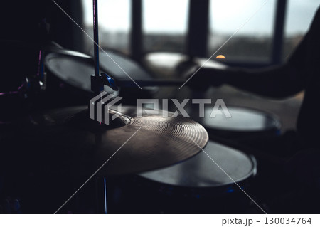 Drum kit, Drum cymbals close-up. Preparation for the concert. Drummer's seat close-up. 130034764