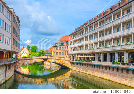 Meat Bridge Fleischbrucke across Pegnitz river water canal and old buildings in Old town Nuremberg city historical center, Middle Franconia region, Bavaria state, Germany Meat Bridge Fleischbrucke across Pegnitz river water canal and old buildings in Old town Nuremberg city historical center, Middle Franconia region, Bavaria state, Germany 130034840