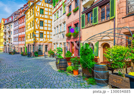 Old town Nuremberg city historical center, pedestrian street Tanner's Lane with old medieval buildings colorful half-timbered houses, Middle Franconia region, Bavaria state, Germany Old town Nuremberg city historical center, pedestrian street Tanner's Lane with old medieval buildings colorful half-timbered houses, Middle Franconia region, Bavaria state, Germany 130034885