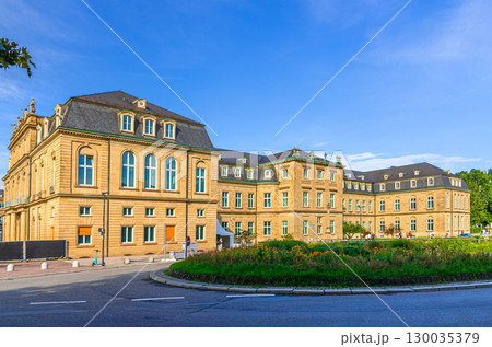 New Palace Neues Schloss Baroque style building lateral wing in old town Stuttgart city historic center with blue sky in sunny summer day, Baden-Wurttemberg state, Germany 130035379