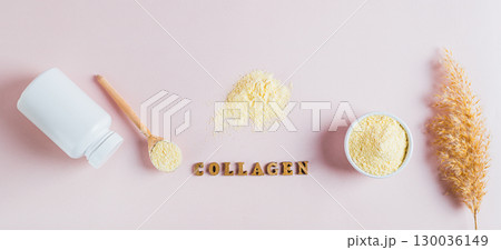 Hydrolyzed collagen protein powder in bowl on table top view web banner 130036149