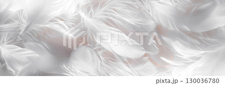 Soft white feathers scattered across a light background create a serene and delicate atmosphere, perfect for design projects and artistic expressions with copy space 130036780