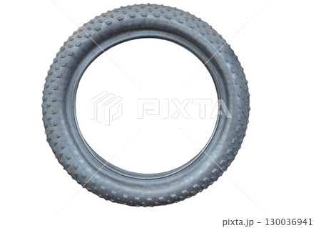 Fat bike tire showing knobby tread for off road adventures 130036941