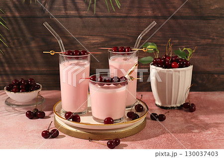 Cherry yogurt with berries in a glass on an elegant table, fruit salad, detox diet and natural nutrition concept, healthy breakfast with ingredients.advertisement of a healthy lifestyle, baby food. 130037403