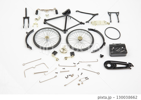 Bicycle parts arranged on a white surface for assembly and maintenance tasks Bicycle parts arranged on a white surface for assembly and maintenance tasks 130038662