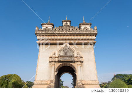Patuxai war monument arch in Vientiane Laos under clear blue sky 130038859