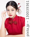 Portrait beauty Asian woman in red Cheongsam Chinese traditional dress isolated on white background. 130039361
