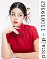 Portrait beauty Asian woman in red Cheongsam Chinese traditional dress isolated on white background. 130039362
