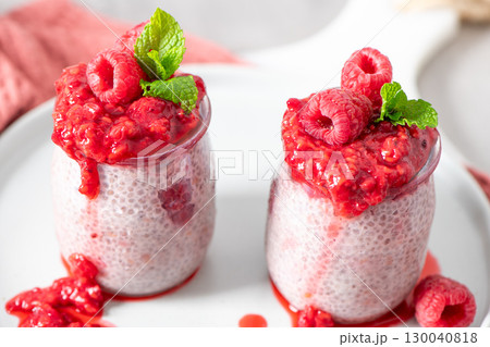 Two jars of homemade raspberry chia pudding Two jars of homemade raspberry chia pudding 130040818