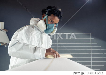 Shaper working on surf board Shaper working on surf board 130041214