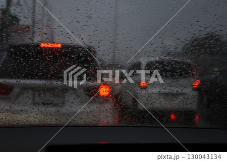 car on highway road with rainny season, blurred image car on highway road with rainny season, blurred image 130043134