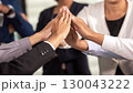 Business partner woman and man team joining and stack hand together for start up new Project. 130043222