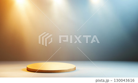 grand golden podium is illuminated by bright spotlights, creating dramatic and elegant atmosphere. stage is set against gradient background, perfect for showcasing products or performances 130043616