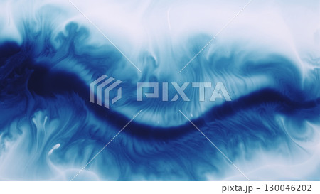 Flowing ink. Spill fluid. Defocused blue white color splash pigment splatter texture spreading on abstract creative art background. 130046202