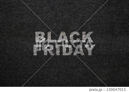 Closeup view of Black Friday on a black background. Copy space. Flat lay. Black Friday sale concept 130047013