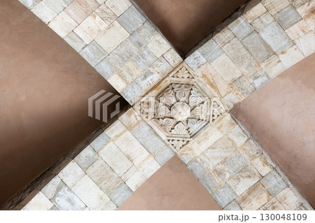 Historic ceiling showcasing vibrant architectural details 130048109
