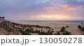 Landscape of Chaves beach resort desert dunes and Atlantic ocean at sunset 130050278