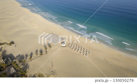 High angle of view of a Chaves beach luxury resort and turquoise ocean High angle of view of a Chaves beach luxury resort and turquoise ocean 130050279