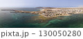 Panorama of the city of Sal Rei and luxury boats moored background the desert 130050280