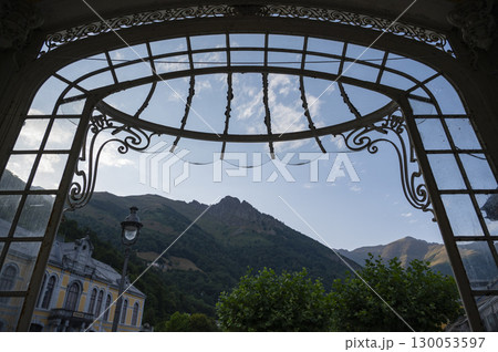 Cauteret architecture blends with mountain landscapes showcasing beautiful historical buildings in a Cauteret architecture blends with mountain landscapes showcasing beautiful historical buildings in a 130053597