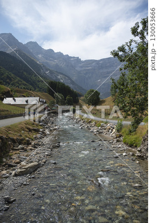 Exploring the picturesque hiking trails in Cirque de Gavarnie while enjoying the stunning scenery of 130053666