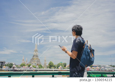 solo travel with asian man chilling see city life in bangkok thailand in summer season 130054215