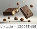 Broken chocolate bar with hazelnuts falling in air with crumbs and pieces, copy space 130055436