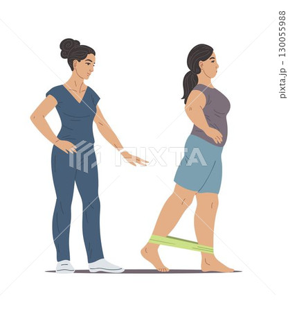 Woman physiotherapist helps female patient exercise with resistance band 130055988