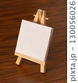 Miniature white canvas on wooden easel 130056026