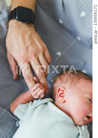 Tender Moments A Parents Loving Touch with Their Precious Newborn Baby, Capturing the Heartwarming Bond Between Parents and Their Infant Through Affectionate Gestures and Caring Support Tender Moments A Parents Loving Touch with Their Precious Newborn Baby, Capturing the Heartwarming Bond Between Parents and Their Infant Through Affectionate Gestures and Caring Support 130056171