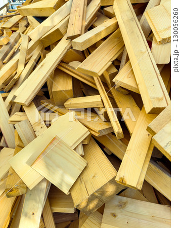 A Pile of Untreated Wooden Planks Ideal for Your Next DIY Projects and Creative Carpentry Endeavors, Providing Excellent Material for Crafts, Building, or Fencing Applications with Ease of Use A Pile of Untreated Wooden Planks Ideal for Your Next DIY Projects and Creative Carpentry Endeavors, Providing Excellent Material for Crafts, Building, or Fencing Applications with Ease of Use 130056260