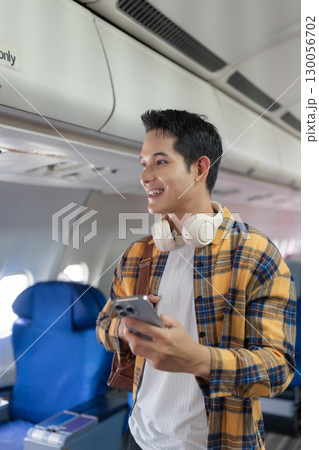 Happy man airplane travel, Portrait of man with journey. 130056702